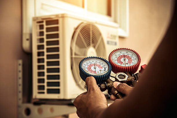 Professional Heat Pump Repair technician working in Amite, LA